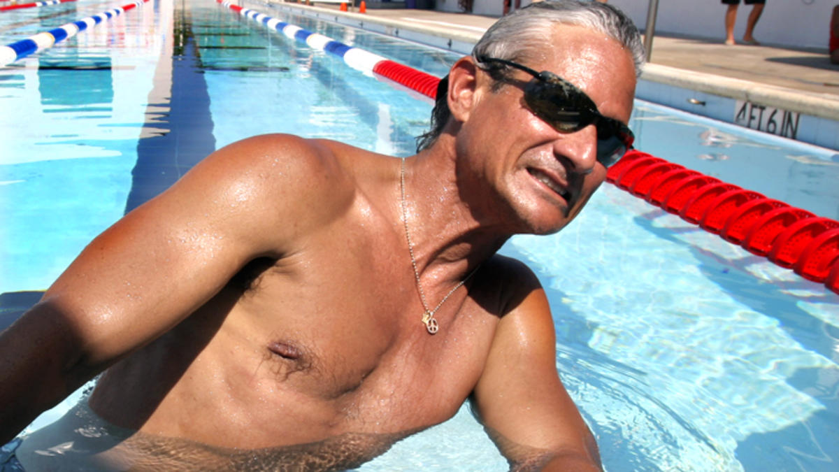 Greg Louganis makes history as first openly gay grand marshal of Rose