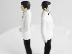 Two groom figurines