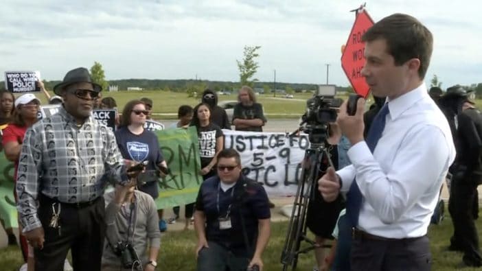 Black Lives Matter protestors confront Pete Buttigieg after a police