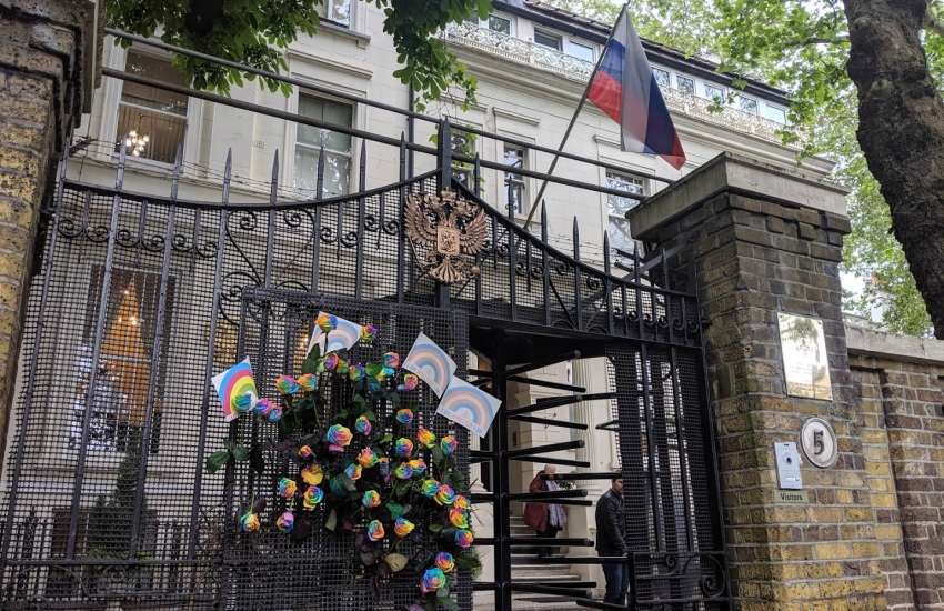As guards politely asked protesters to pack-up, some supports decorated the mesh gates with dozens of rainbow roses