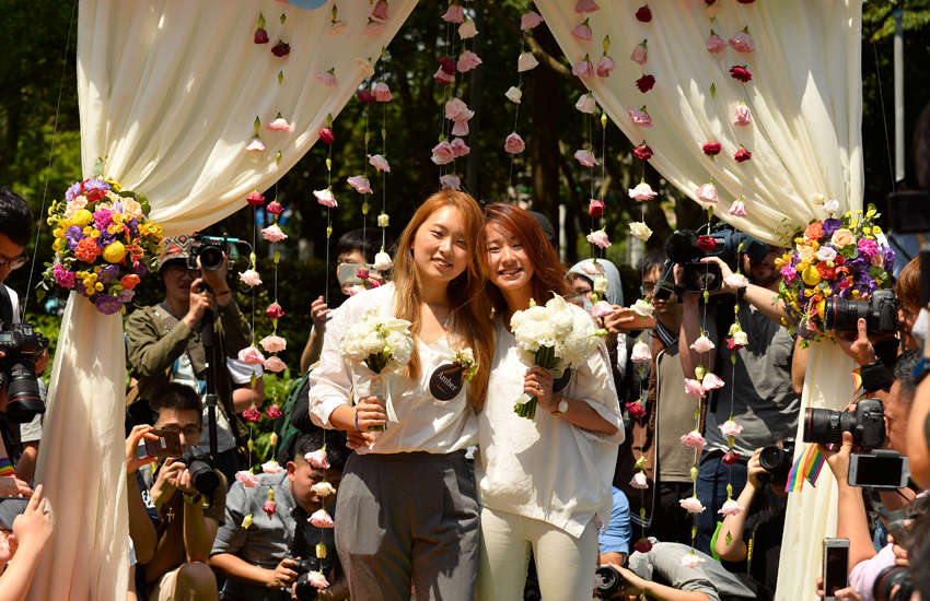 Famous YouTubers Amber and Huan were among the same-sex couples to wed on Friday (Photo: Provided)