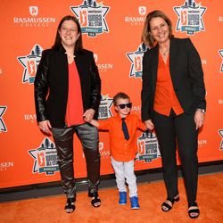 WNBA Minnesota Lynx head coach Cheryl Reeve, right, with her wife, Lynx team vice president Carley Knox, and their son Oliver, on the orange carpet.