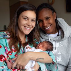 Bobbi Jo Lamar Brunson and her wife, Rebekkah Brunson, with their baby, Graham.